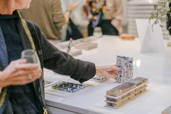 Guests perused different types of tile at the sample bar